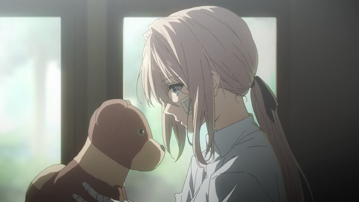 Violet Evergarden contemplates a stuffed toy